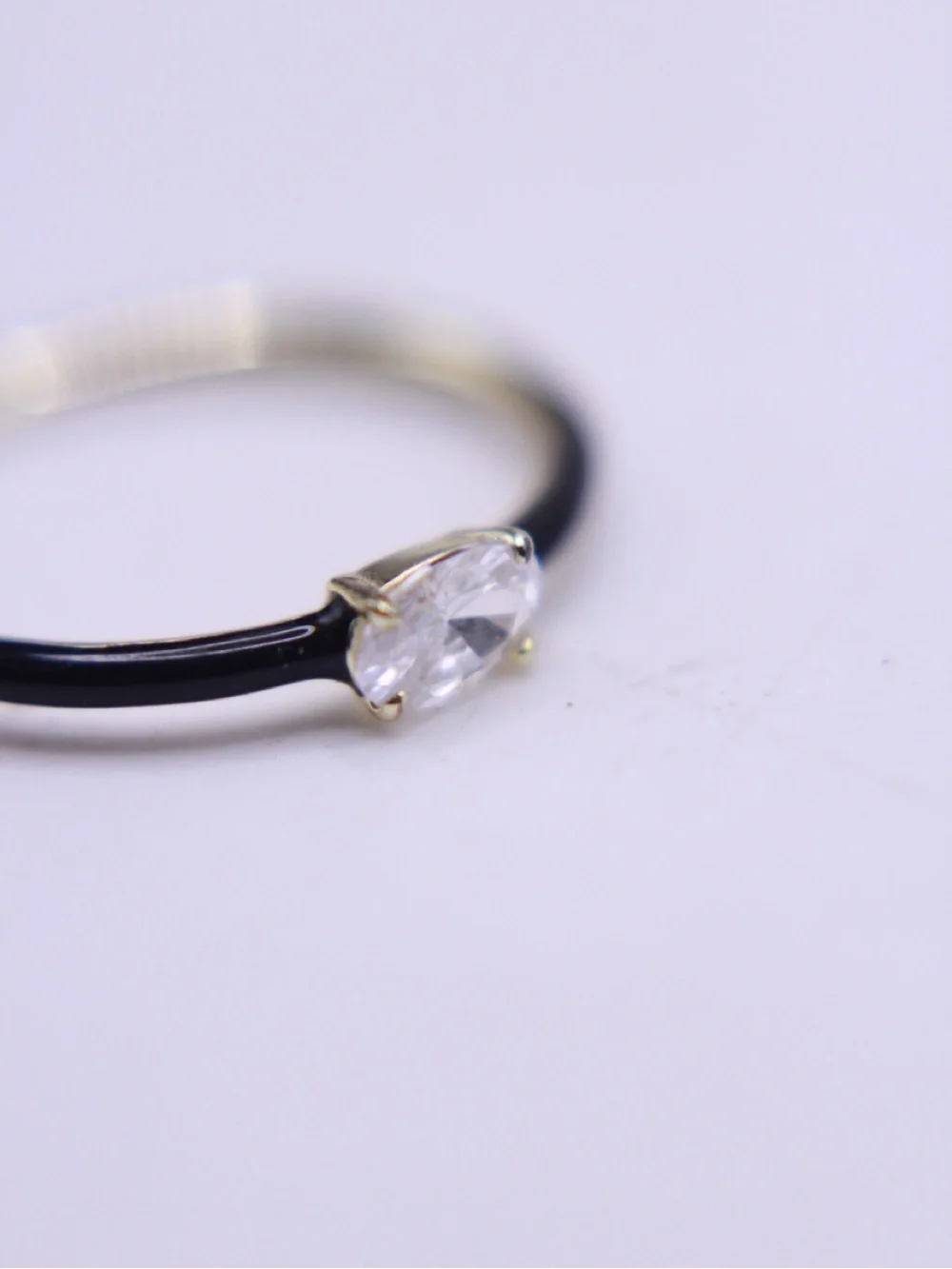 MM Black enamel two tone gold plated Band Ring with Clear Oval Crystal